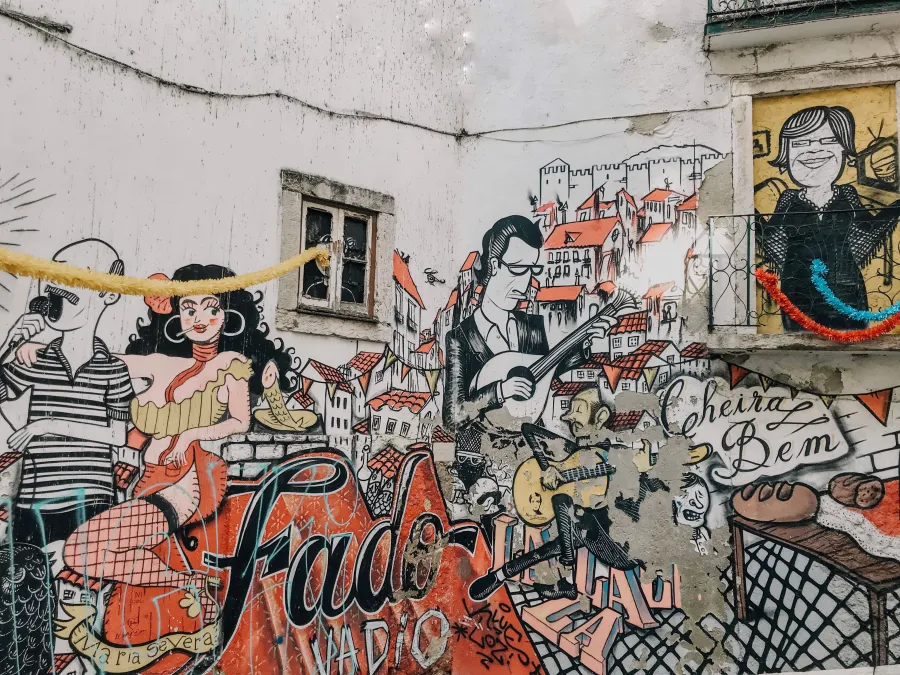 Colorful Fado-themed mural with musicians and Lisbon houses
